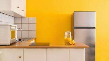 Departamento familiar | Cocina privada | Parrilla de estufa, tostadora, utensilios de cocina y isla de cocina