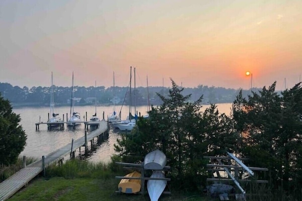 View of marina from living room and private deck.