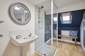 Shower, hair dryer, shampoo