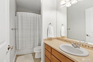 Hair dryer, towels, soap, toilet paper