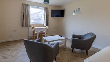 Studio, 1 Double Bed, Courtyard View | Living area | 42-inch Smart TV with satellite channels