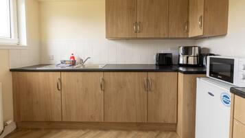 Fridge, microwave, electric kettle, toaster