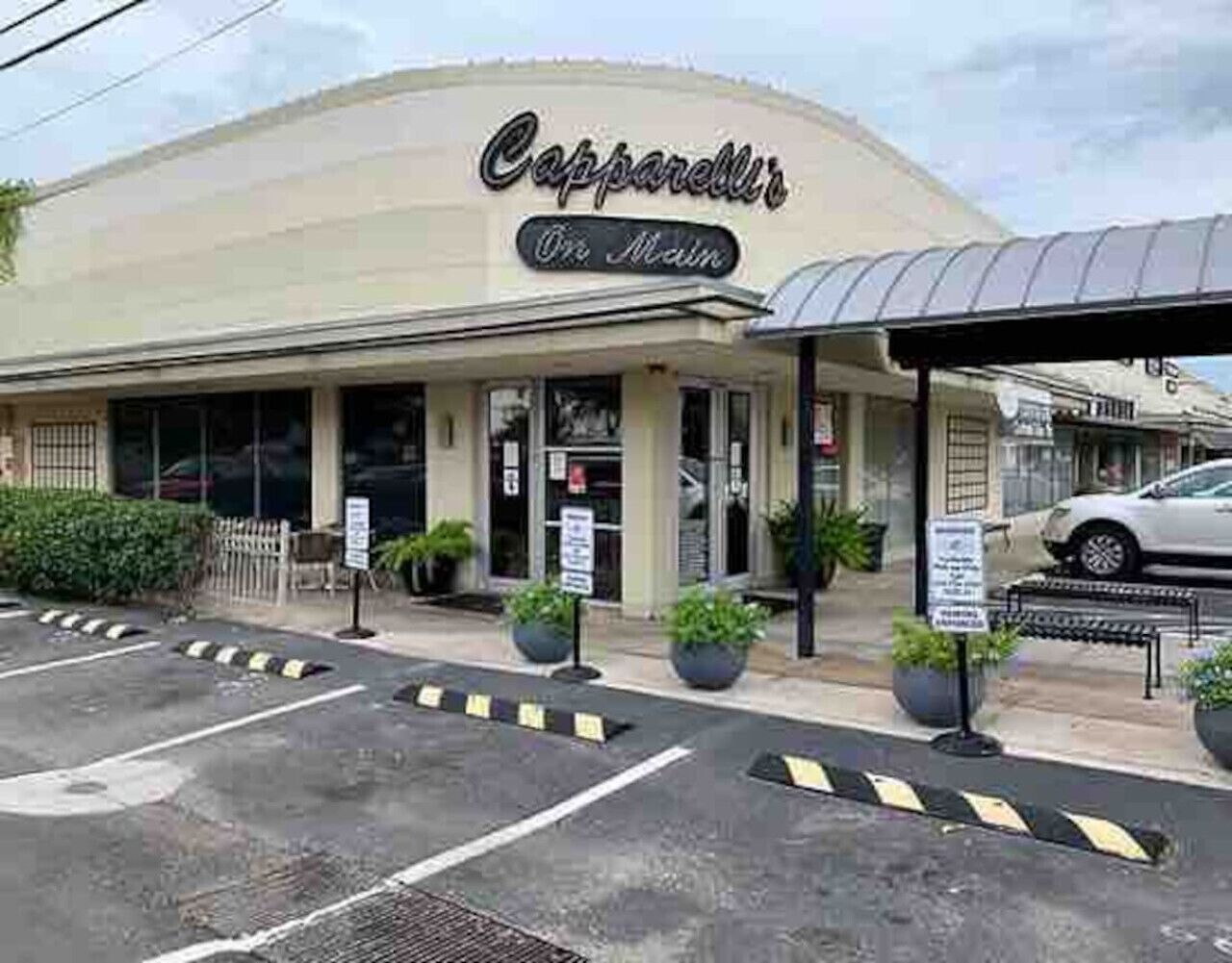 A building with a sign reading "Capparelli's On Main".