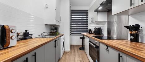 Apartment | Private kitchen | Fridge, microwave, oven, stovetop