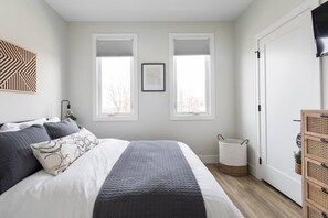 1 bedroom, desk, iron/ironing board, travel crib