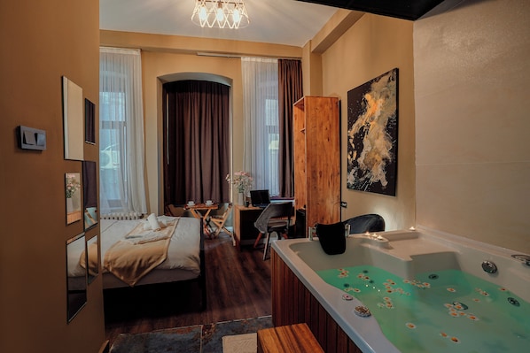 Suite Studio Deluxe, 1 grand lit | Baignoire à jets