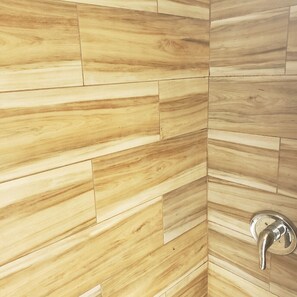 Shower, hair dryer, towels, toilet paper