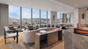 Presidential Suite, 1 King Bed | Living area | 55-inch LED TV with cable channels, books - Hilton Kathmandu (Kathmandu)