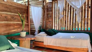 Deluxe Quadruple Room | Bed sheets