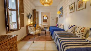 Suite junior | 1 dormitorio, ropa de cama de alta calidad, caja fuerte