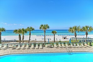 On the beach - Beach Serenity: 2BR Coastal Haven w/ Beach Chairs (Panama City Beach)
