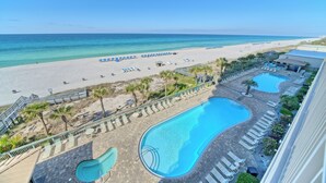 A resort with a pool area, beach access, and a view of the ocean. - Gulf Crest 502 | Your 2BR Escape on the Gulf!! Beach Service** (Panama City Beach)