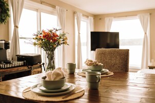 Panoramic Suite, Ocean View | Living area | 42-inch LCD TV with cable channels, streaming services