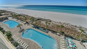 A resort with two swimming pools, beach access, and a view of the ocean. - Gulf Crest 606: Escape to a Cozy 2-Bedroom with Gulf Views! (Panama City Beach)
