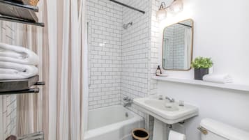 Hair dryer, towels, soap, shampoo