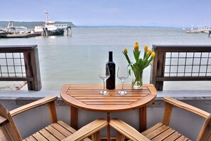 Outdoor dining - Waterfront 1 bedroom condo - private deck offering spectacular views (Langley)