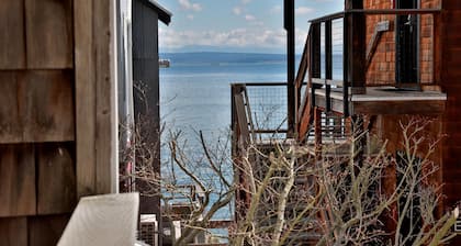 Two-story townhouse just steps from the waters edge with a private deck. Perfect accommodations for families. Recently remodeled. Beautifully appointed