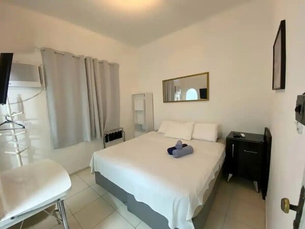 1 habitación, tabla de planchar con plancha, wifi y ropa de cama 