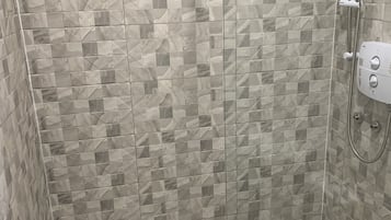 Hair dryer, towels, soap, shampoo