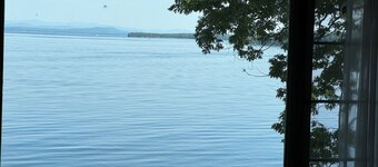 A New York camp on Lake Champlain, private pebble beach frontage.