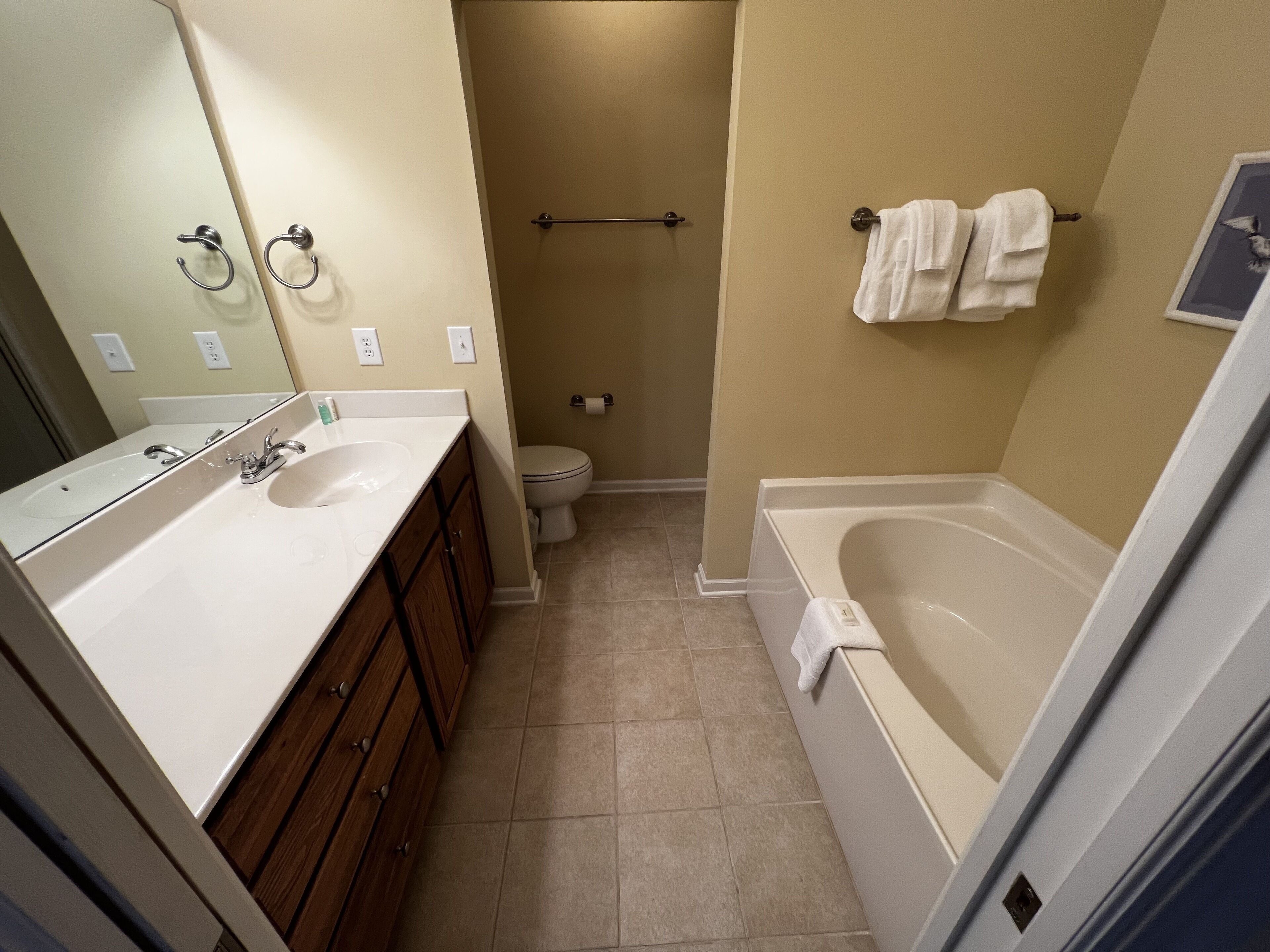 Shower, jetted bath, towels, soap