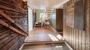 A wooden interior with a staircase leading to a second floor. - Gorgeous home in Svatsum with WiFi (Svatsum)