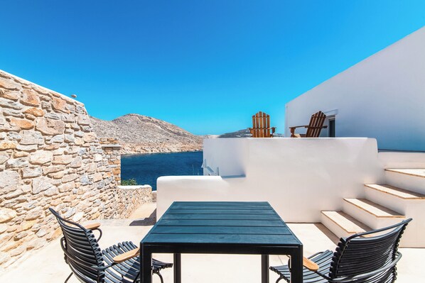 Outdoor dining - The ultimate island retreat with our Premium Nest Suite. (Ormos Panormou)