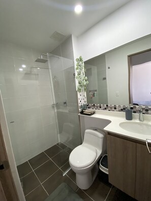 Shower, towels, soap, shampoo