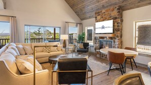 TV, fireplace - New Log Cabin with Private Hot Tub, Free Daily Activities, Arcade & Shuffleboard (Branson)