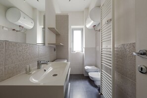 Shower, free toiletries, hair dryer, bathrobes