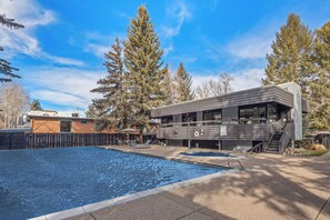 A heated pool - Chateau Roaring Fork 24 | Remodeled Condo w/ River Views, Large TVs, Fireplace. Near Gondola! (Aspen)