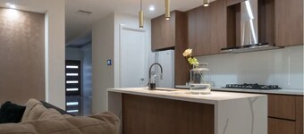 Homely Getaway with Major Movie Apps 65" Smart TV