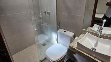 Shower, rainfall showerhead, towels, soap