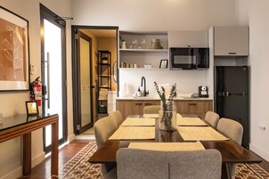 Presidential Suite | Private kitchen | Full-size fridge, microwave, stovetop, espresso maker