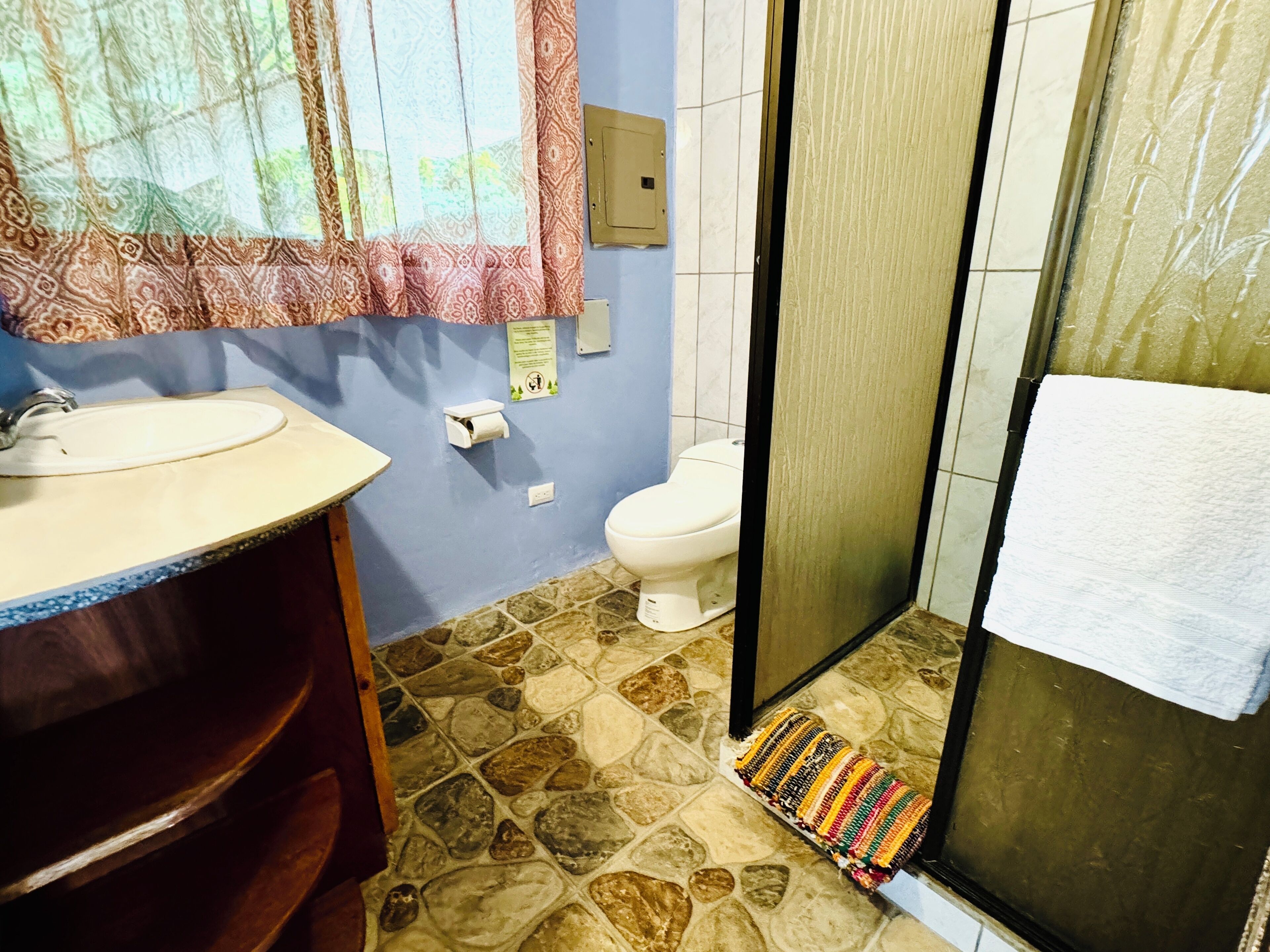 Shower, towels, soap, shampoo