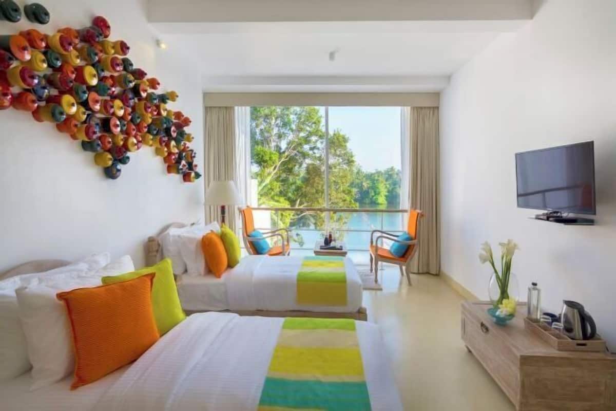 Bộ đồ giường cao cấp, minibar, két bảo mật tại phòng