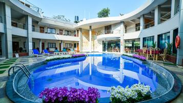 Indoor pool, pool umbrellas, sun loungers
