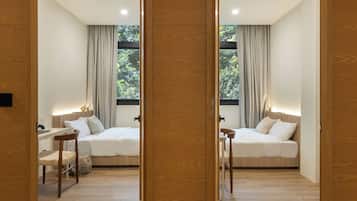 Family Suite, 2 Bedrooms, Kitchenette | Premium bedding, in-room safe, desk, laptop workspace