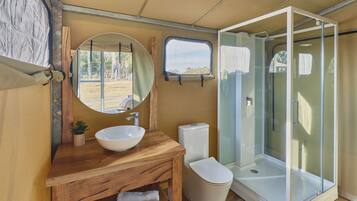 Standard Tent | Bathroom | Separate bathtub and shower, rainfall showerhead, hair dryer, bathrobes