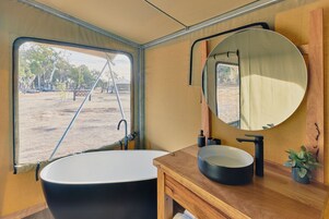 Premier Tent | Bathroom | Separate tub and shower, rainfall showerhead, hair dryer, bathrobes