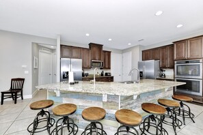 Fridge, oven, stovetop, dishwasher - Astounding Home near Disney with Themed & Media Room, Pool Table with Waterpark. (Kissimmee)