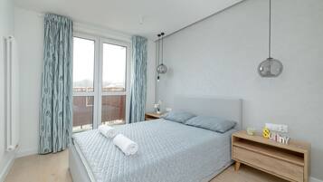 Apartamento, 1 habitación, balcón | 1 dormitorio y ropa de cama