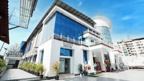 A modern building with a sign reading "MADHAV RESIDENCY HOTEL". - Madhav Residency Hotel & Banquet, Kalyan, Mumbai (Thane)