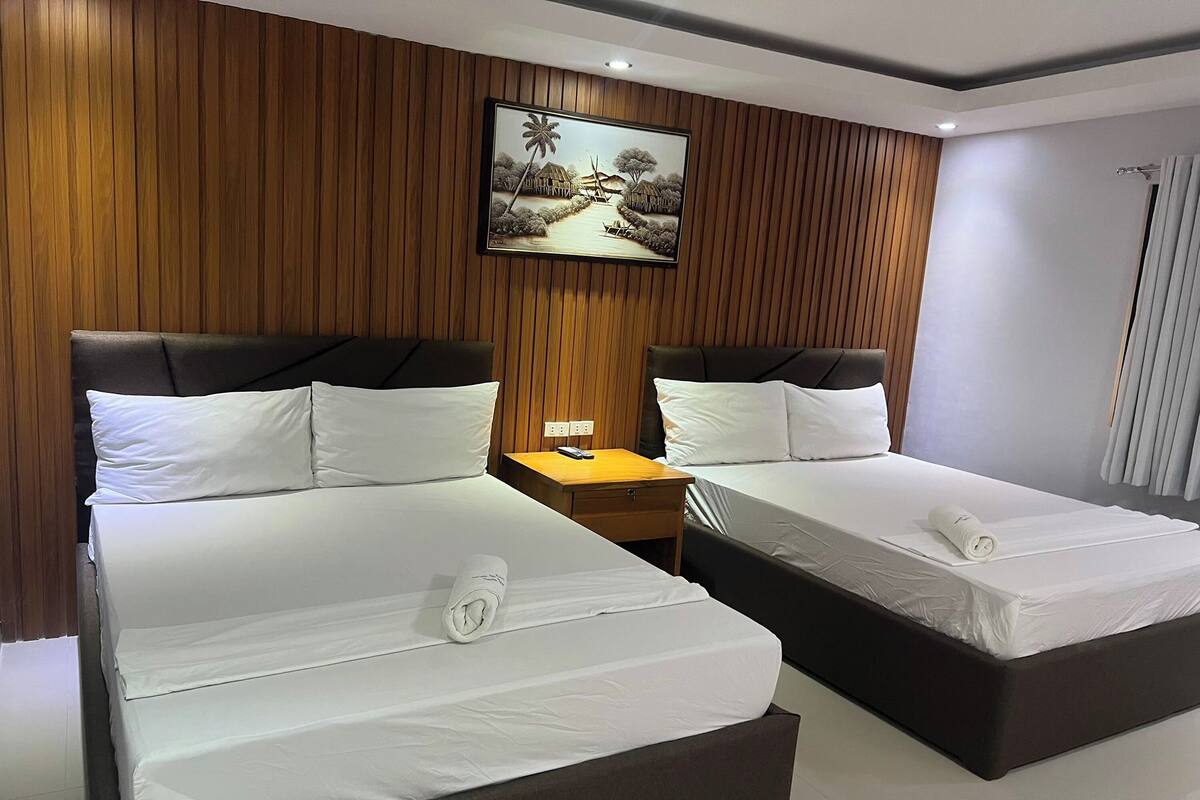 Desk, blackout curtains, rollaway beds, free WiFi