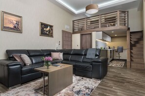 Maisonette I | Living area | 50-inch Smart TV with cable channels, Netflix, streaming services