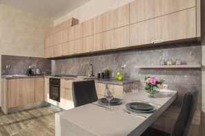 Luxury One-Bedroom Apartment - Corner | Private kitchen | Mini-fridge, oven, stovetop, espresso maker - Sevtopolis Apartments (Kazanlak)