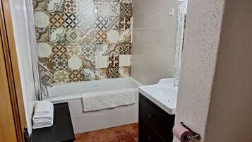 Shower, towels, toilet paper