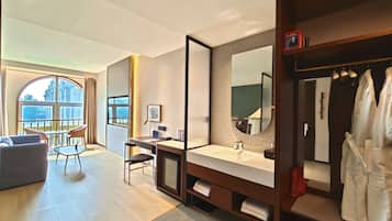 Signature Quadruple Room, Courtyard View | Premium bedding, in-room safe, desk, laptop workspace