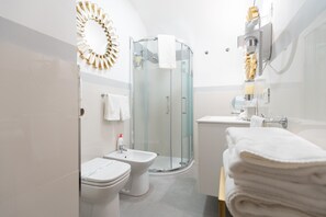 Shower, jetted bath, hair dryer, bidet