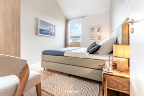 2 slaapkamers, een strijkplank/strijkijzer, reisbedje, gratis wifi